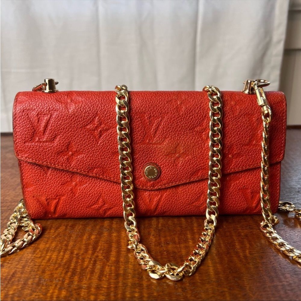 Louis Vuitton Orange Monogram Empreinte Curieuse mini bag